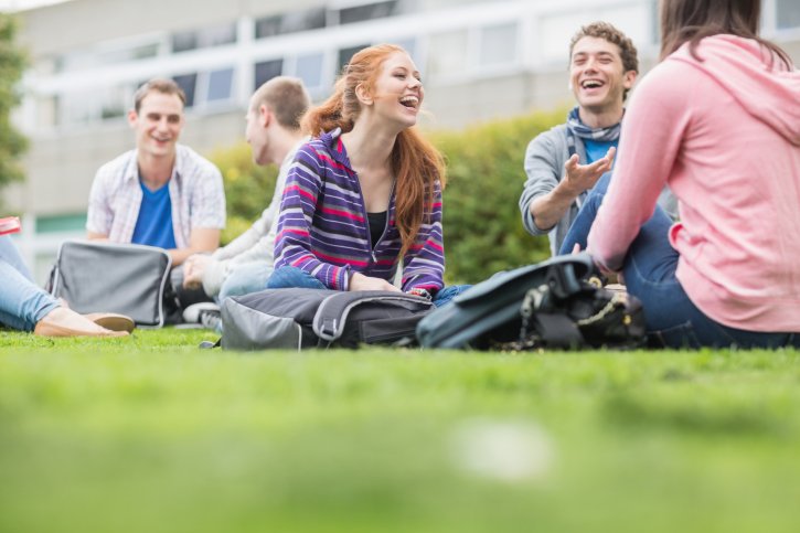 students on campus discussing student housing in Seattle