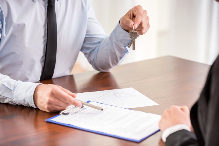 landlord reviewing lease documents