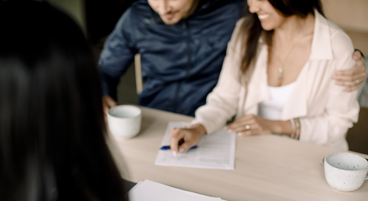 Couple getting pre-approved to purchase their first home